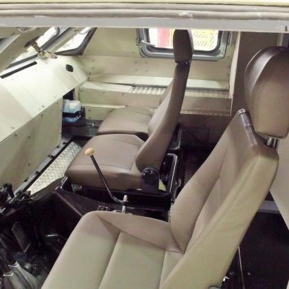 (末日装甲房车防丧尸)末日生存挑战:揭秘丧尸末日装甲车的设计与进化历程 (末日装甲房车防丧尸)末日生存挑战:揭秘丧尸末日装甲车的设计与进化历程